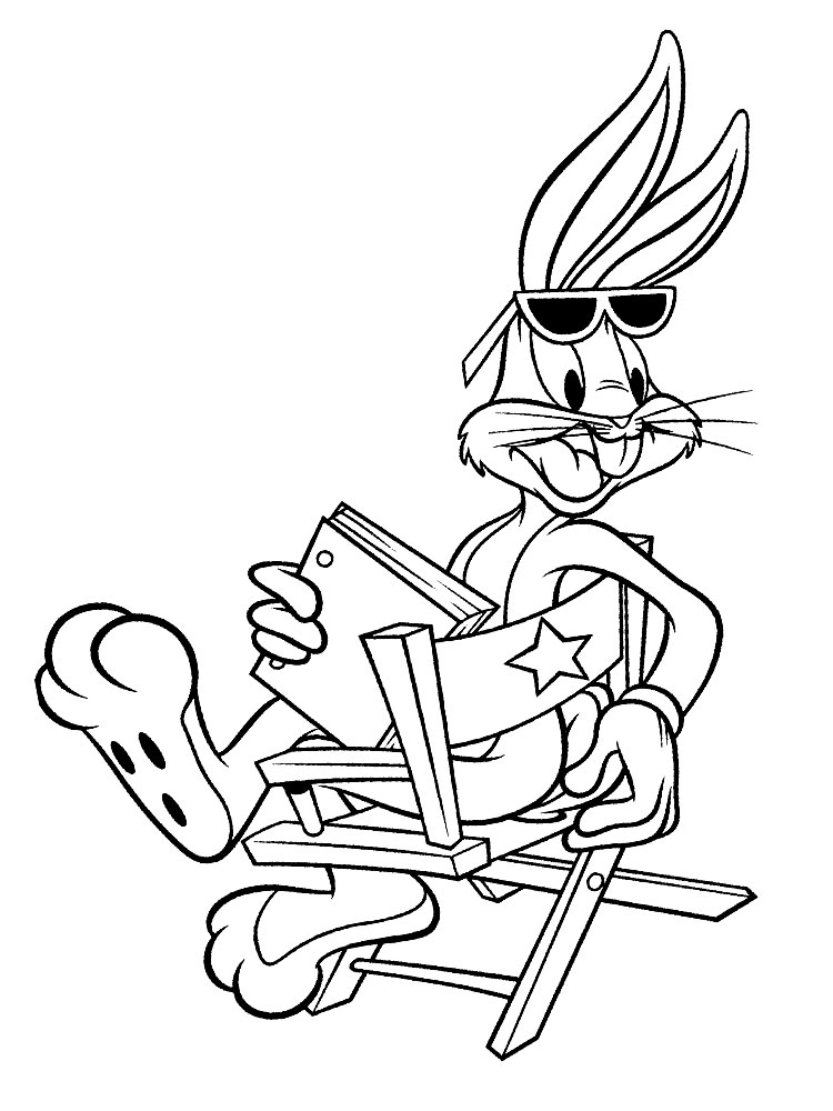 Кролик - весельчак отдыхает в своем любимом кресле.